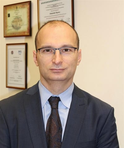 Доц. Александър  Райнов дм