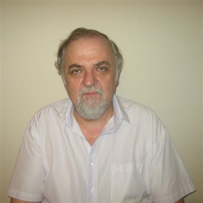 Проф. Емил  Кумчев дм