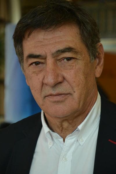 проф. Тома Пожарлиев